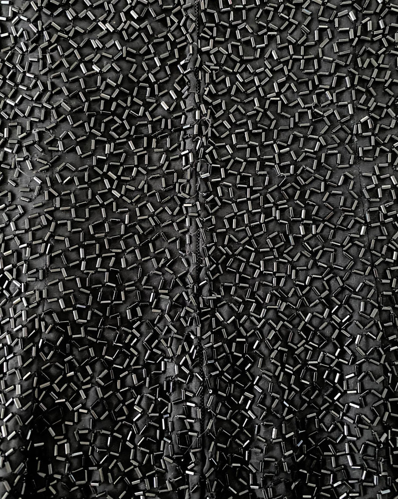FRUIT Vintage Bob Mackie beaded and sequin gown from the 1980s! This beautiful statement piece features crystal and sequin embellishments in various shapes, a draped satin skirt and high neck collar.