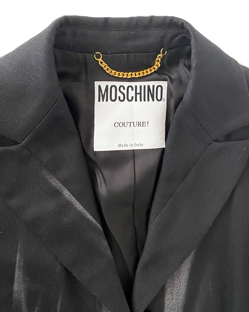 FRUIT Vintage Moschino 90s Flame Jacket as worn by Fran Drescher on the Nanny! It features a flame and smoke print on the hem line and sleeves going up the jacket.