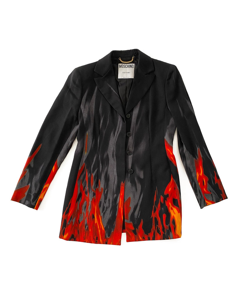FRUIT Vintage Moschino 90s Flame Jacket as worn by Fran Drescher on the Nanny! It features a flame and smoke print on the hem line and sleeves going up the jacket.