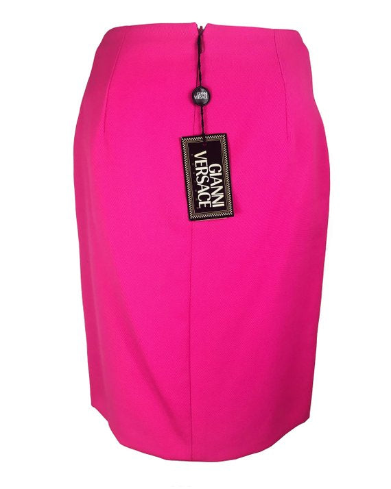 FRUIT Vintage neon pink lifetime Gianni Versace skirt with the original tags still attached. This piece dates to 1996 and features a classic slim fit and high waist design.
