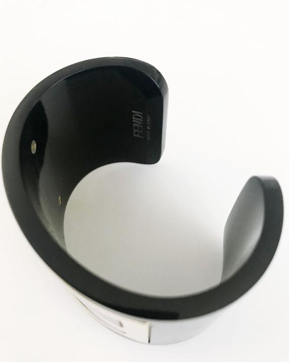 FRUIT Vintage Fendi Zucca Monogram Logo Cuff Bracelet. Featuring large brass Fendi logo F's set in black perspex.