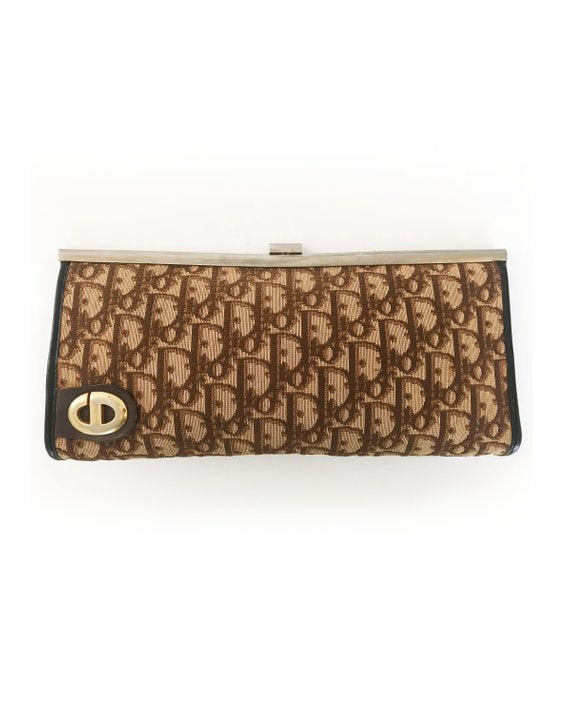 FRUIT vintage 1970s Christian Dior clutch bag is made of Brown oblique monogram logo trotter print canvas and features a gold hardware clip top closure.