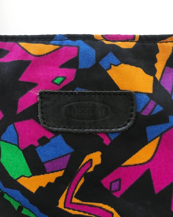 Fruit Vintage 1980s Missoni beach bag in a psychedelic logo printed nylon fabric. Features a zipper closure at top and internal zipped pocket.