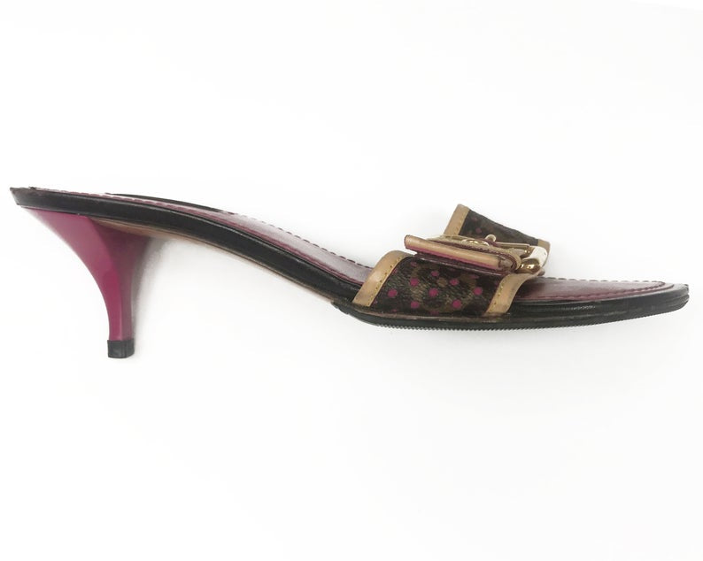FRUIT Vintage Louis Vuitton kitten heels monogram canvas mules with logo buckles. Feature a perforated logo canvas with pink trim and classic tan leather.