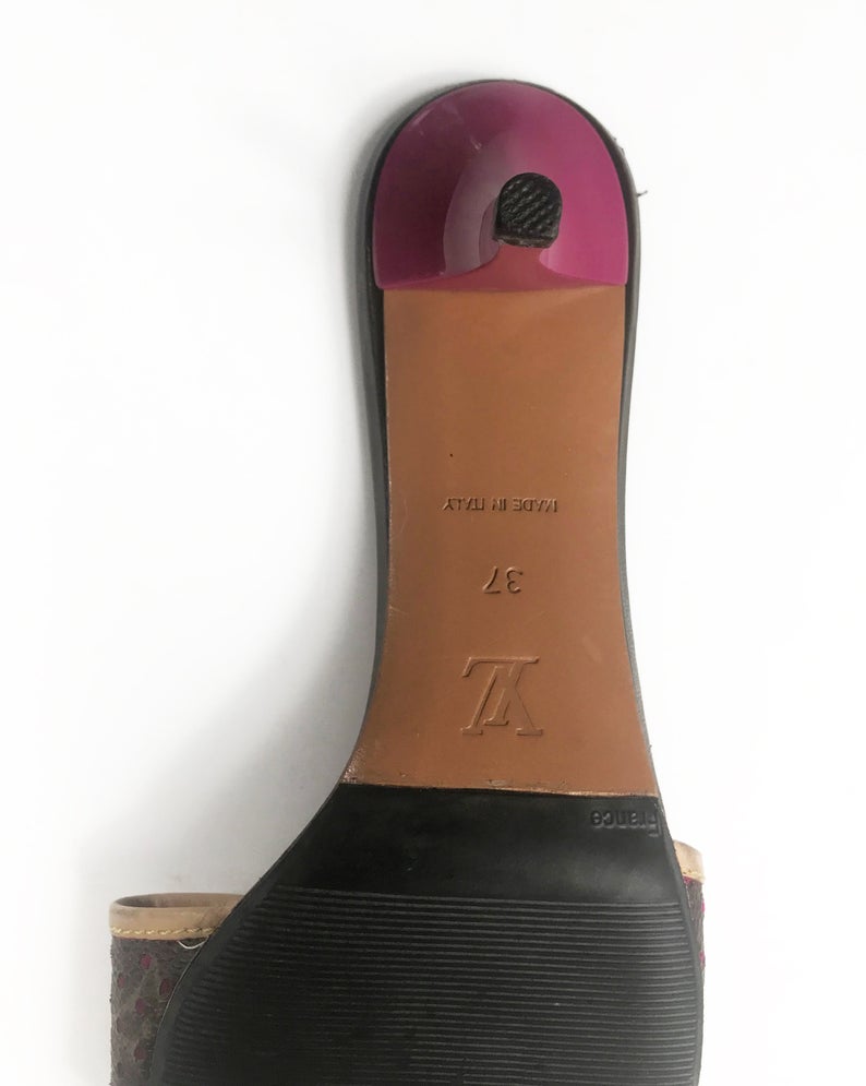 FRUIT Vintage Louis Vuitton kitten heels monogram canvas mules with logo buckles. Feature a perforated logo canvas with pink trim and classic tan leather.