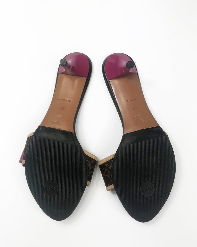 FRUIT Vintage Louis Vuitton kitten heels monogram canvas mules with logo buckles. Feature a perforated logo canvas with pink trim and classic tan leather.