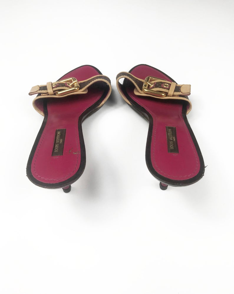 FRUIT Vintage Louis Vuitton kitten heels monogram canvas mules with logo buckles. Feature a perforated logo canvas with pink trim and classic tan leather.