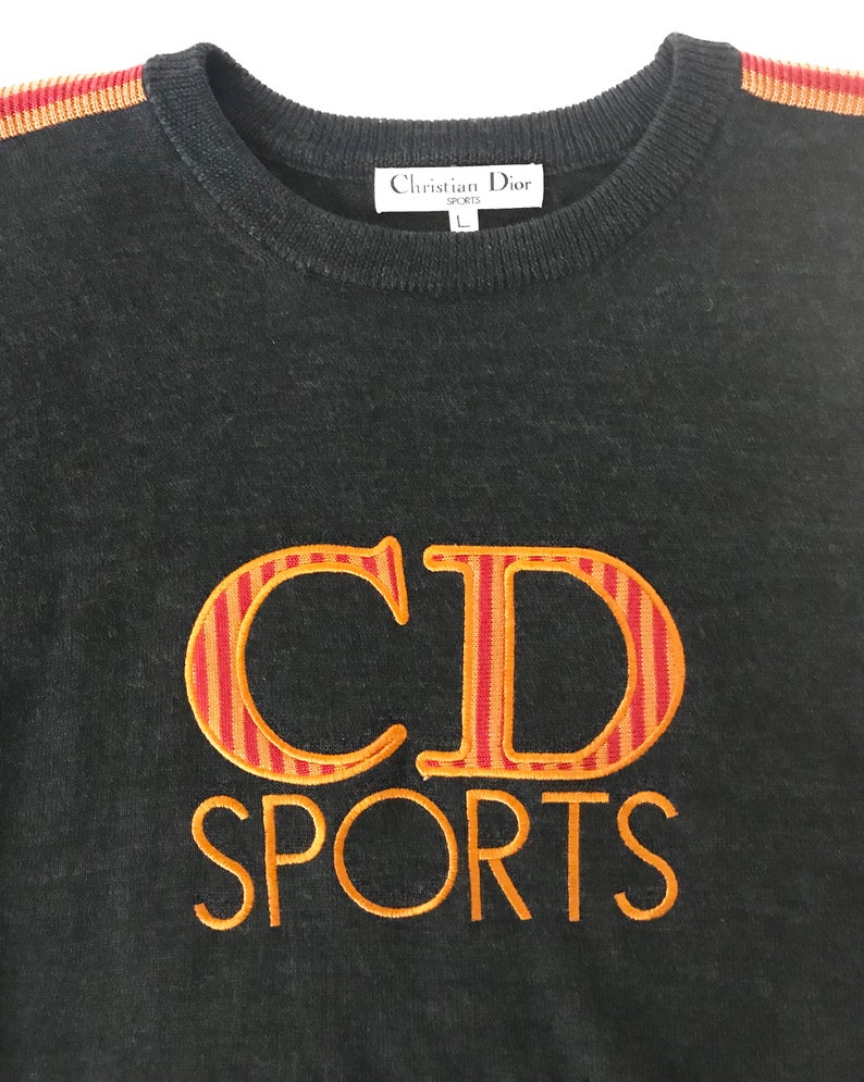 Fruit Vintage Christian Dior Sport CD sweat shirt from the 1980s. It features an large embroidered CD logo at front and ribbed fabric