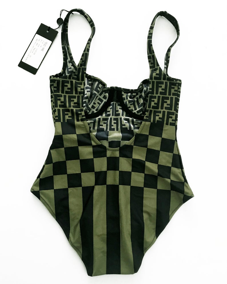 FRUIT vintage Mint condition Fendi Zucca print swimsuit from the 90s. This amazing monogram logo set is a collectors dream. Features a lingerie style bra top with the iconic Fendi logo monogram and Fendi checkerboard print design. This would also make an incredible bodysuit for day wear.