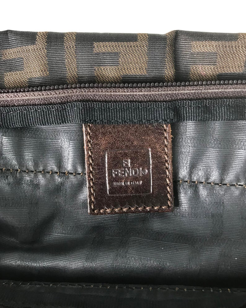 FRUIT Vintage Fendi Zucca mini small logo tote bag in the classic Fendi Zucca canvas. It features leather handles and trim (its can be folded into a small square for travel!)