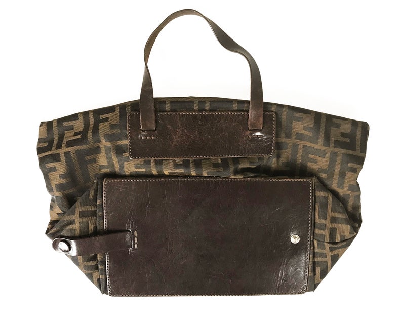 FRUIT Vintage Fendi Zucca mini small logo tote bag in the classic Fendi Zucca canvas. It features leather handles and trim (its can be folded into a small square for travel!)