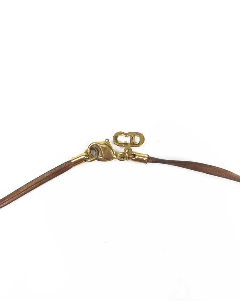 Fruit Vintage Christian Dior CD logo monogram pendant necklace on leather strap.
