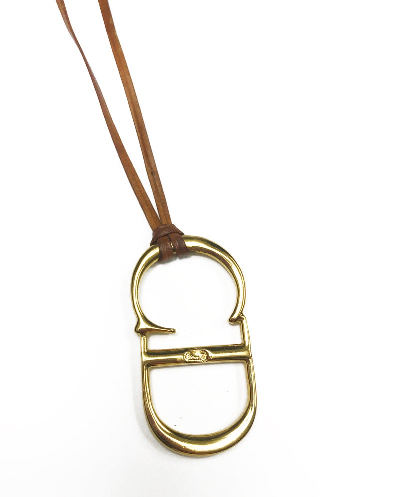 Fruit Vintage Christian Dior CD logo monogram pendant necklace on leather strap.