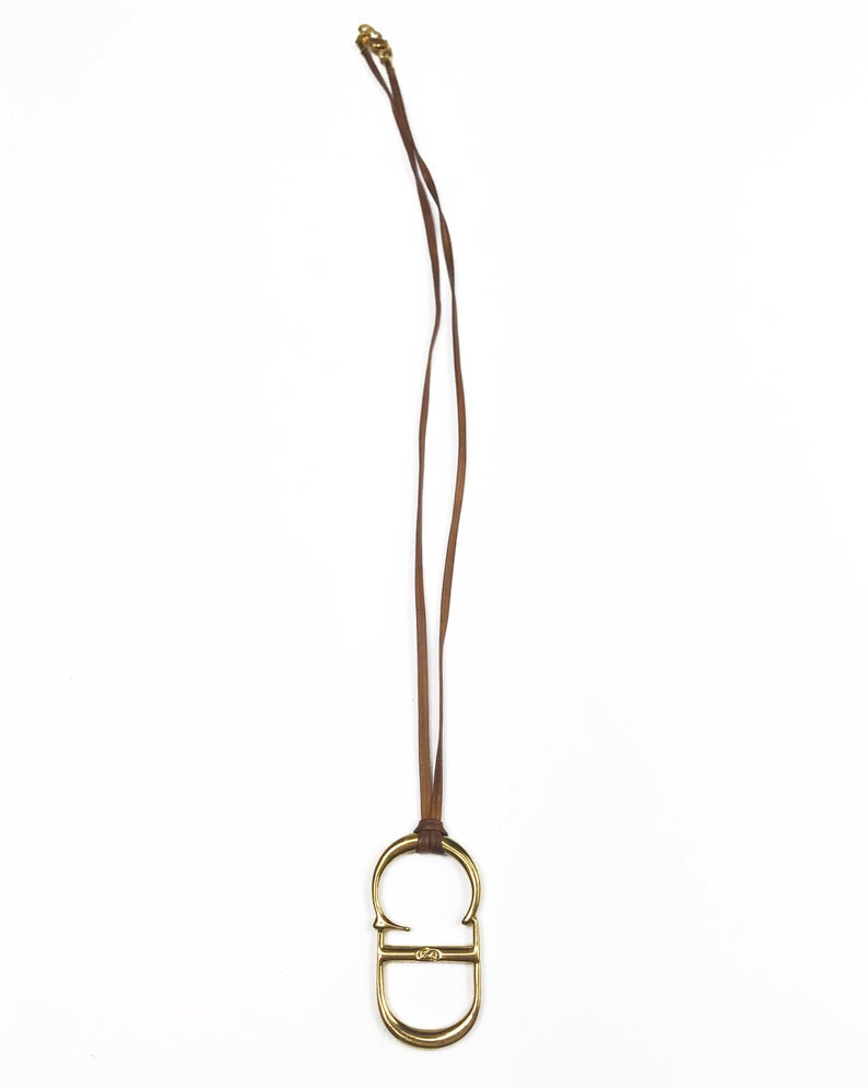Fruit Vintage Christian Dior CD logo monogram pendant necklace on leather strap.
