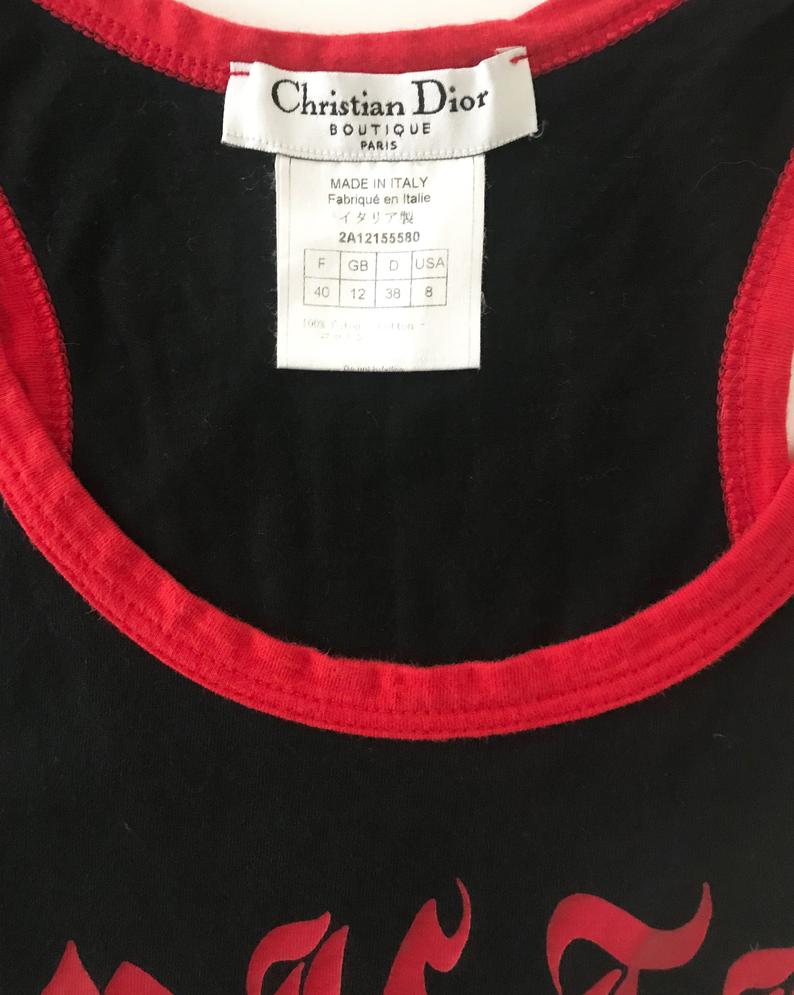 Fruit Vintage Christian Dior tank designed by John Galliano with Gothic text Logo. Features a classic racer tank cut and graphic print with Christian Dior across the front and 1947 across the back