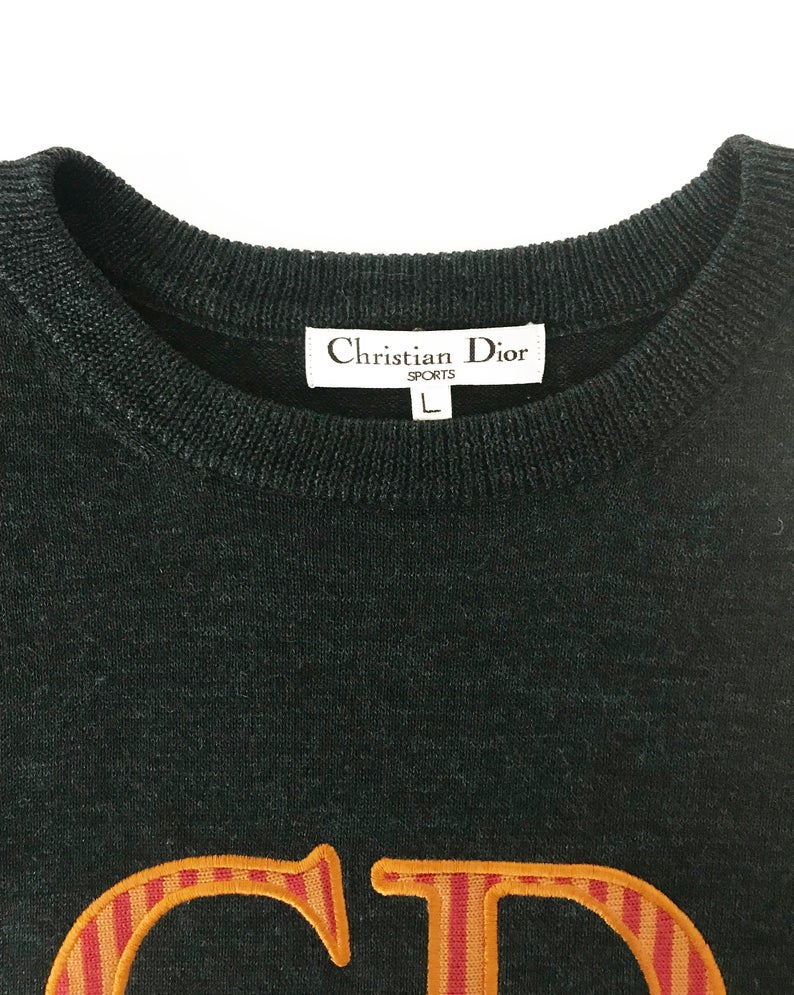 Fruit Vintage Christian Dior Sport CD sweat shirt from the 1980s. It features an large embroidered CD logo at front and ribbed fabric