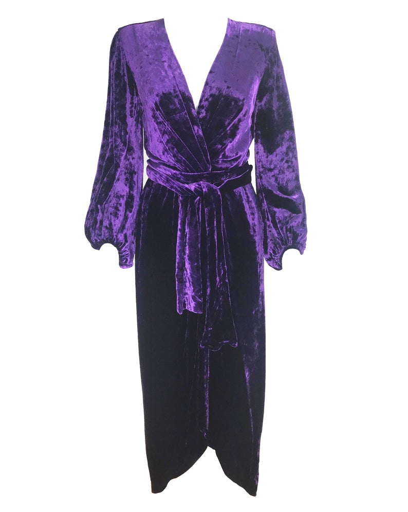 FRUIT Vintage Yves Saint Laurent Rive Gauche purple velvet gown dating to the 1970s. YSL dress features a plunging neckline, gorgeous 70s bell sleeves and removable wrap tie belt. It can be worn as a dress or unclipped and worn as a duster jacket/robe.