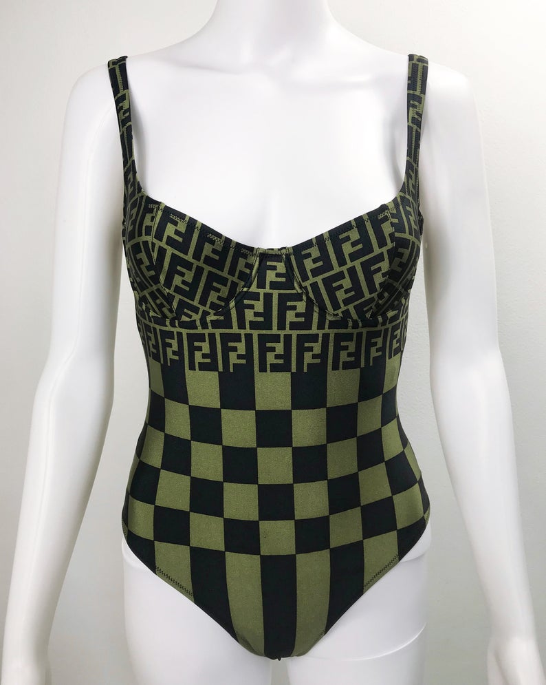 FRUIT vintage Mint condition Fendi Zucca print swimsuit from the 90s. This amazing monogram logo set is a collectors dream. Features a lingerie style bra top with the iconic Fendi logo monogram and Fendi checkerboard print design. This would also make an incredible bodysuit for day wear.