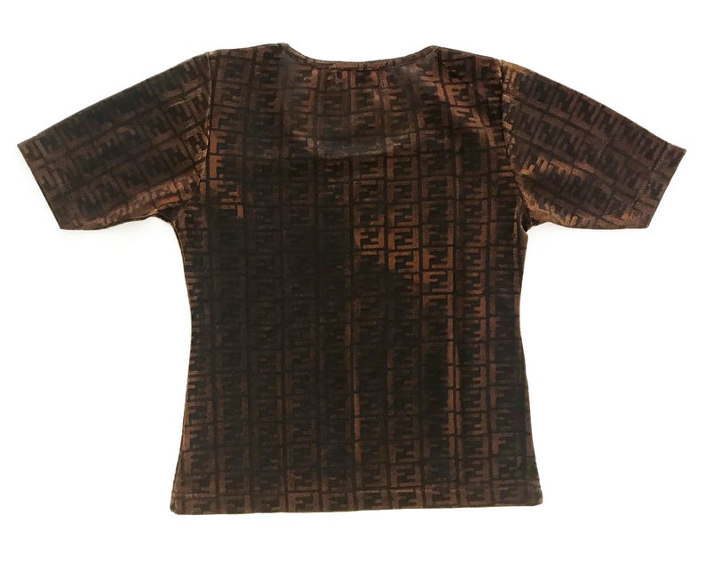 FRUIT vintage Fendi Zucca print t-shirt dating to the 90s, made from the cutest metallic effect sheen fabric which changes colour in light. Features a classic t-shirt cut and semi-transparent mesh style fabric.