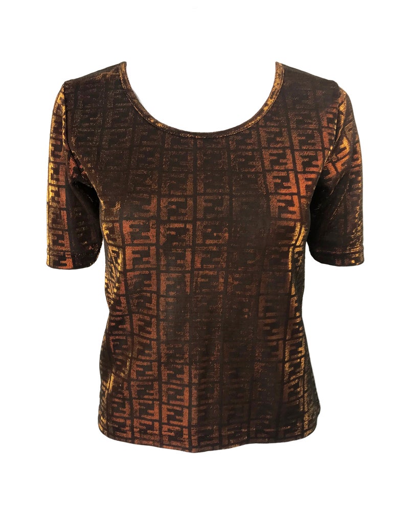FRUIT vintage Fendi Zucca print t-shirt dating to the 90s, made from the cutest metallic effect sheen fabric which changes colour in light. Features a classic t-shirt cut and semi-transparent mesh style fabric.