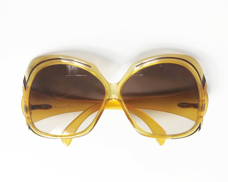 Fruit Vintage Christian Dior yellow 1970s oversize logo sunglasses in excellent condition. They feature Dior CD logos on each arm and brown gradient lenses.