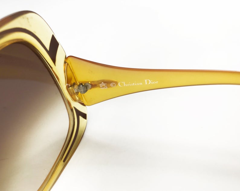 Fruit Vintage Christian Dior yellow 1970s oversize logo sunglasses in excellent condition. They feature Dior CD logos on each arm and brown gradient lenses.