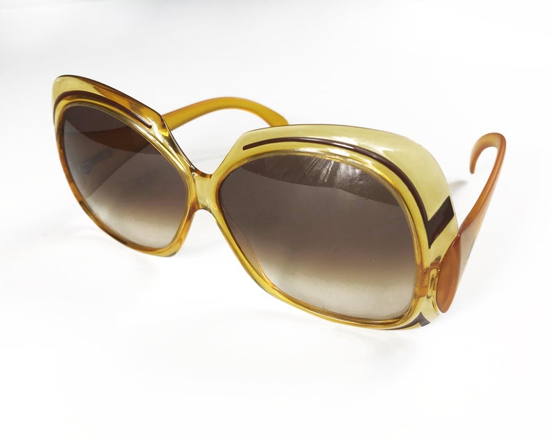 Fruit Vintage Christian Dior yellow 1970s oversize logo sunglasses in excellent condition. They feature Dior CD logos on each arm and brown gradient lenses.