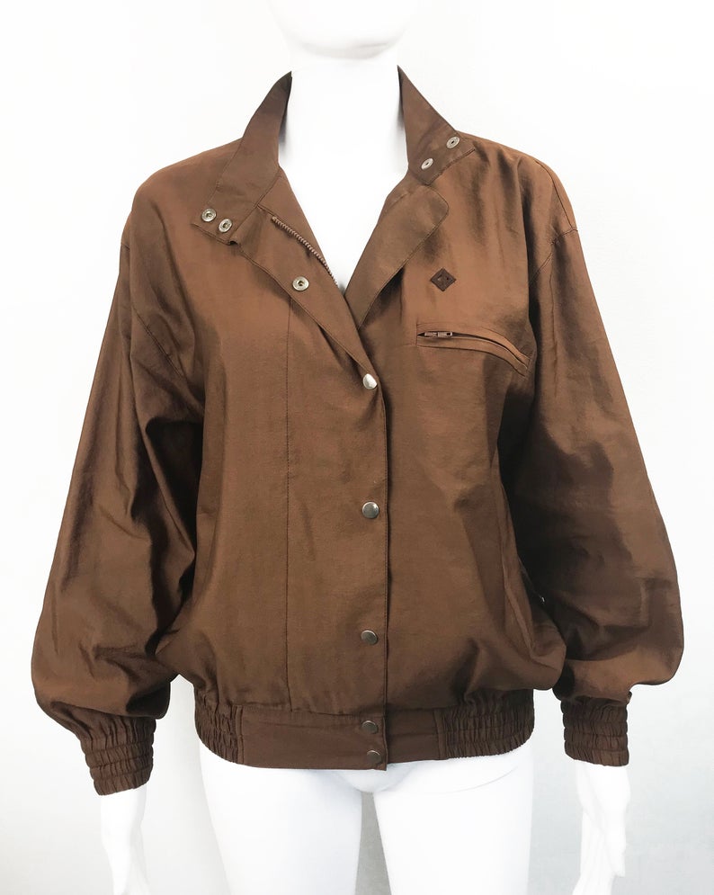 FRUIT vintage rare Christian Dior Sports Logo bomber jacket from the 1980s. It features a classic 1980s bomber jacket cut, and large Christian Dior Sport text logo printed at rear.