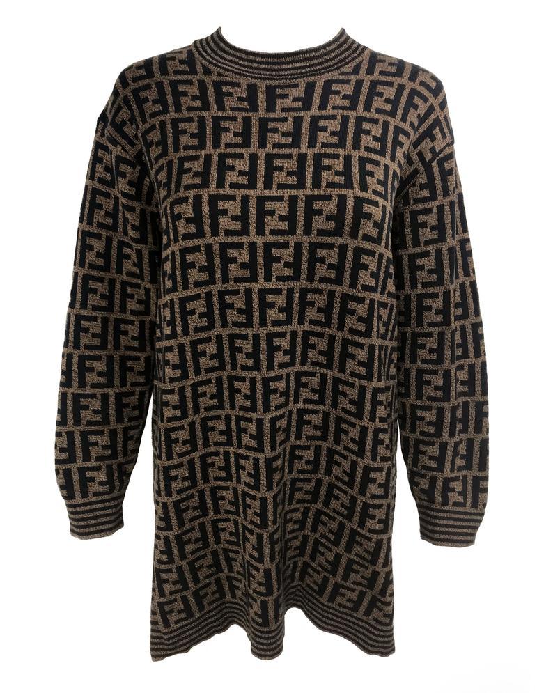 FRUIT vintage Fendi Zucca design sweater dating to the 1990s. This monogram knit features side splits and striped design on sleeves and neck. The logo is knitted into the jumper (intarsia style), the design is cut for a long-line, slightly oversized fit.