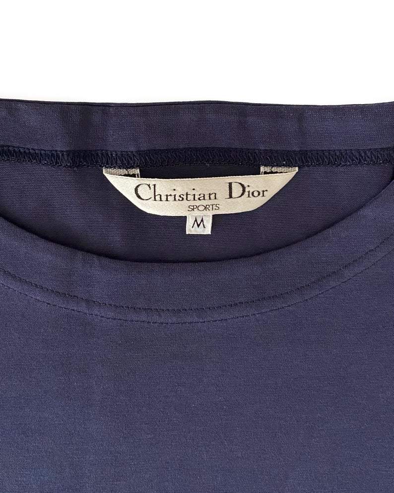 Fruit Vintage Christian Dior Sport Blue Logo 1980s t-shirt. It features a large embroidered logo design at front and slightly oversized cut.