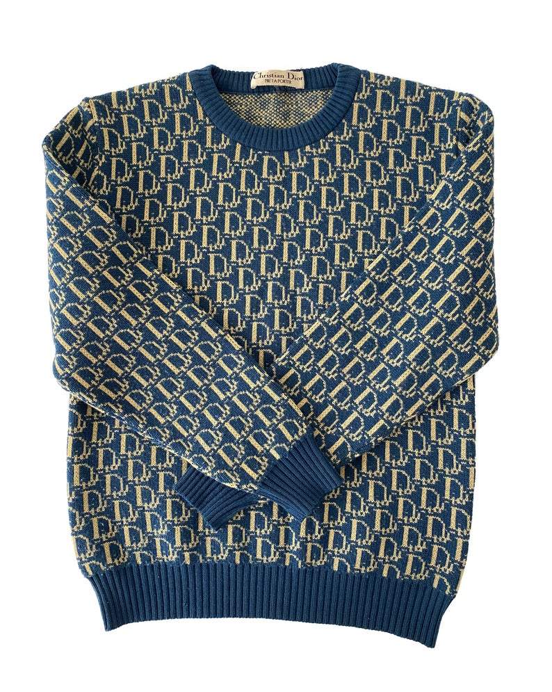 Fruit Vintage 1980s Christian Dior rare navy logo knit sweater. It features the iconic oblique print knitted into the weave of the fabric all over and a classic sweater cut.