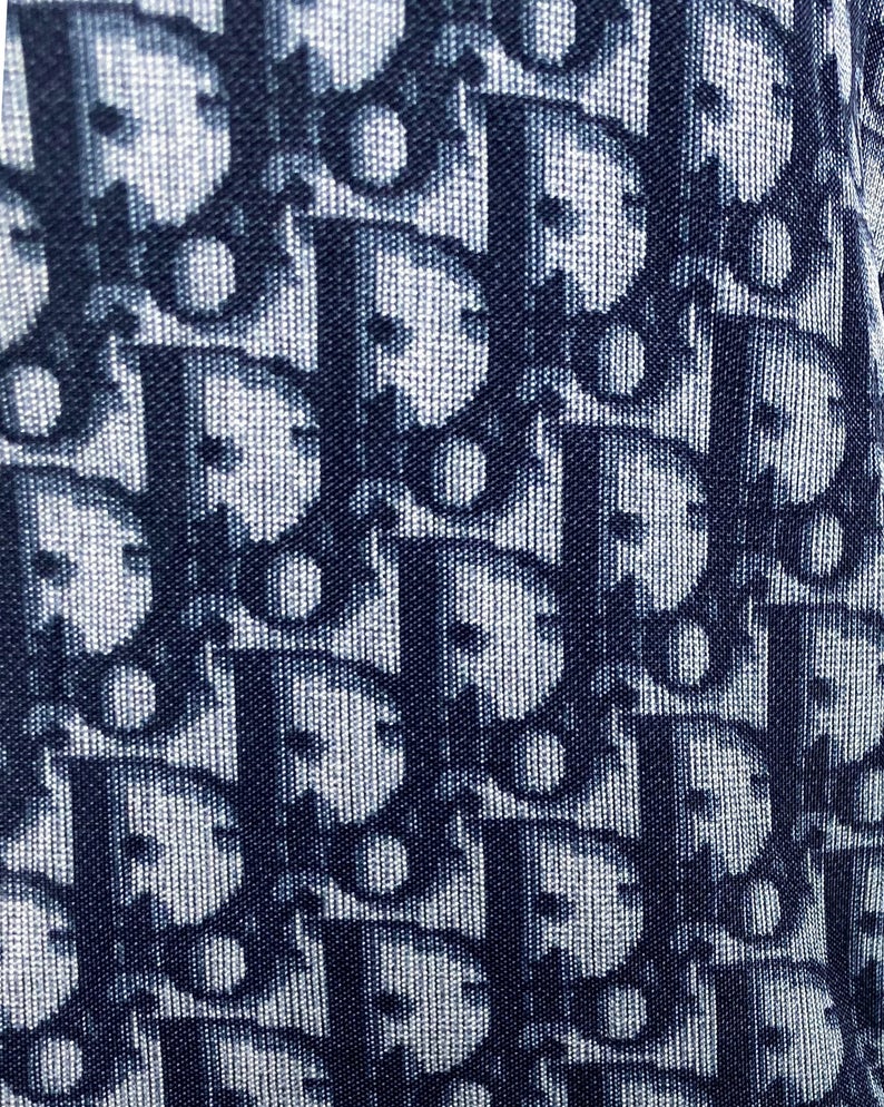 Fruit Vintage Christian Dior oblique logo zipper knit is about as iconic as it gets. Inspired by the original Dior trotter monogram canvas luggage and accessories, and re-released under the creative direction of John Galliano.