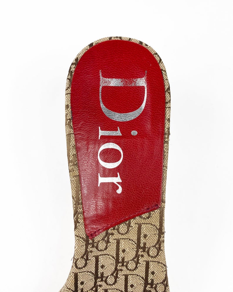 Fruit Vintage Christian Dior rasta logo kitten heel mules in monogram canvas. They feature the iconic Dior number in leather appliqué and racing stripes in cotton twill.
