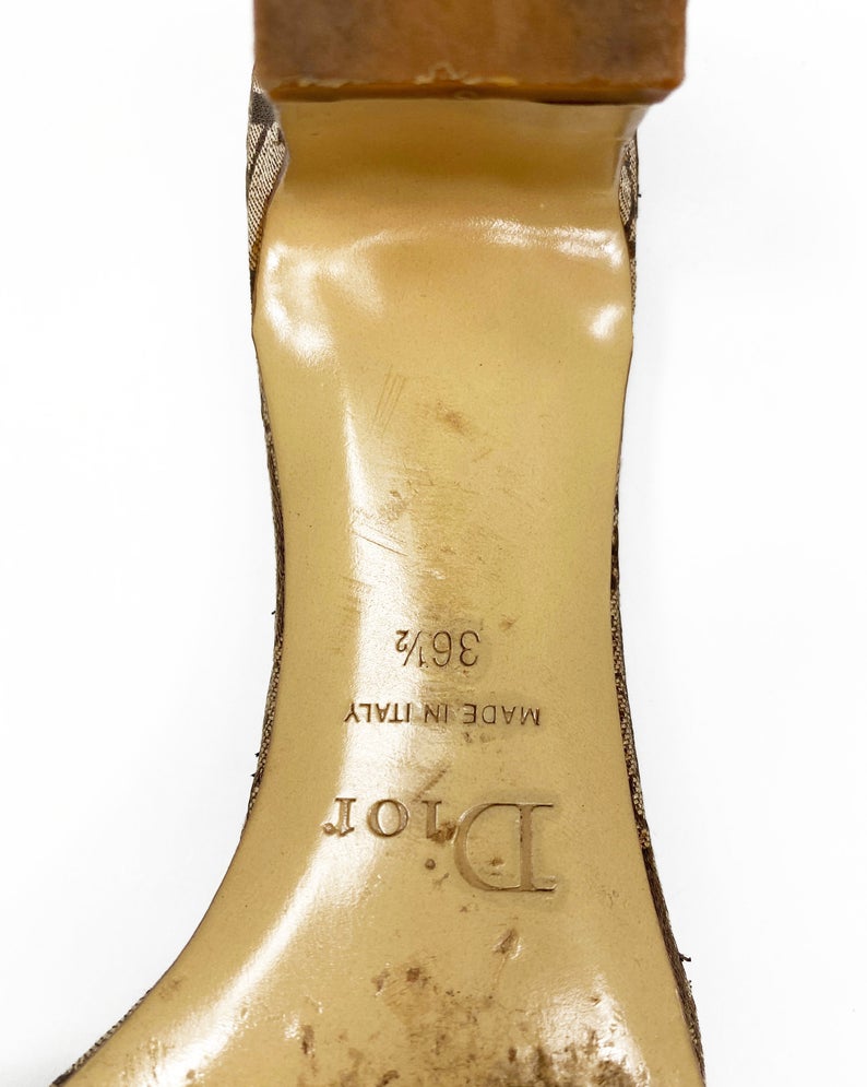 Fruit Vintage Christian Dior rasta logo kitten heel mules in monogram canvas. They feature the iconic Dior number in leather appliqué and racing stripes in cotton twill.
