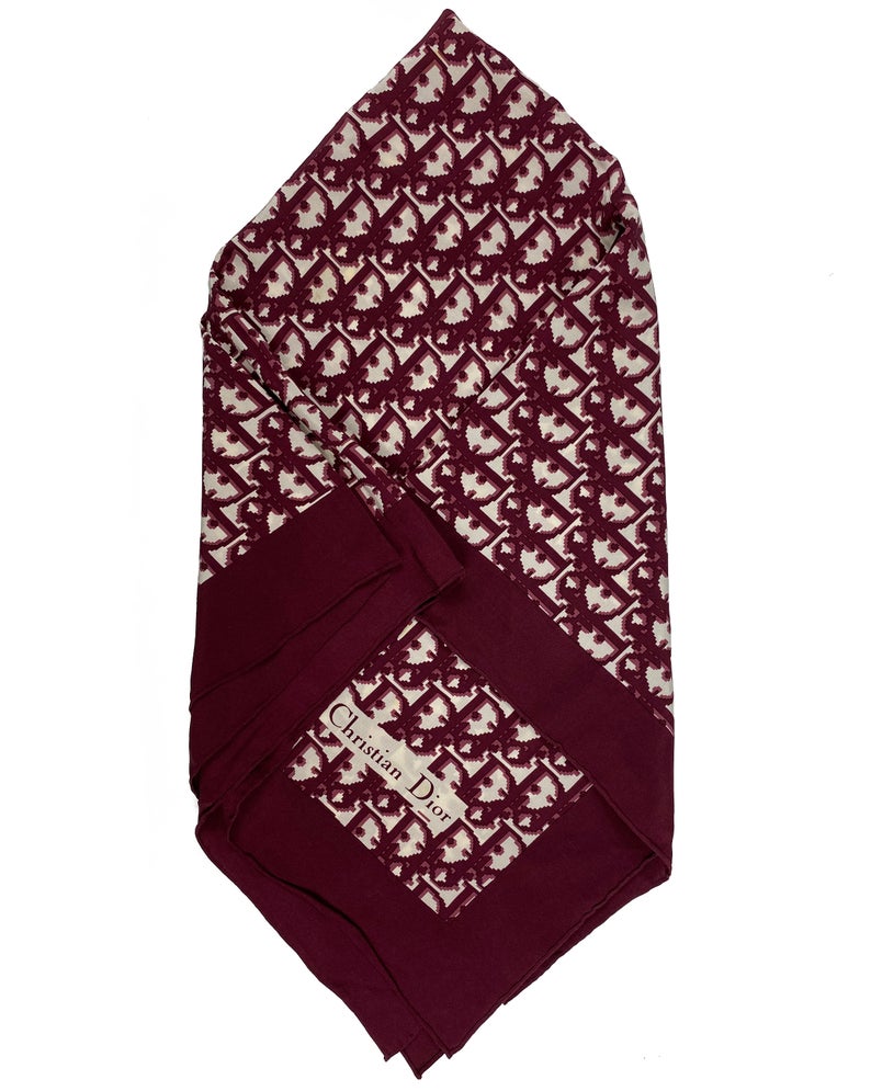 Fruit Vintage Christian Dior oblique print silk scarf, perfect for use as a hair accessory, to tie around a hat or even wear as a handkerchief top. Features a bold graphic Dior logo print and hand finished rolled hem edging.