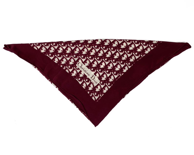 Fruit Vintage Christian Dior oblique print silk scarf, perfect for use as a hair accessory, to tie around a hat or even wear as a handkerchief top. Features a bold graphic Dior logo print and hand finished rolled hem edging.