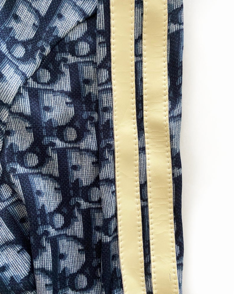 Fruit Vintage Christian Dior oblique logo zipper knit is about as iconic as it gets. Inspired by the original Dior trotter monogram canvas luggage and accessories, and re-released under the creative direction of John Galliano.