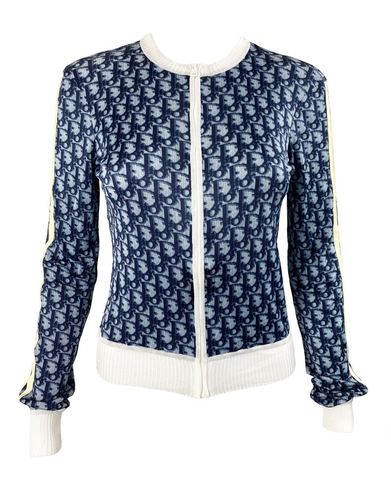 Fruit Vintage Christian Dior oblique logo zipper knit is about as iconic as it gets. Inspired by the original Dior trotter monogram canvas luggage and accessories, and re-released under the creative direction of John Galliano.