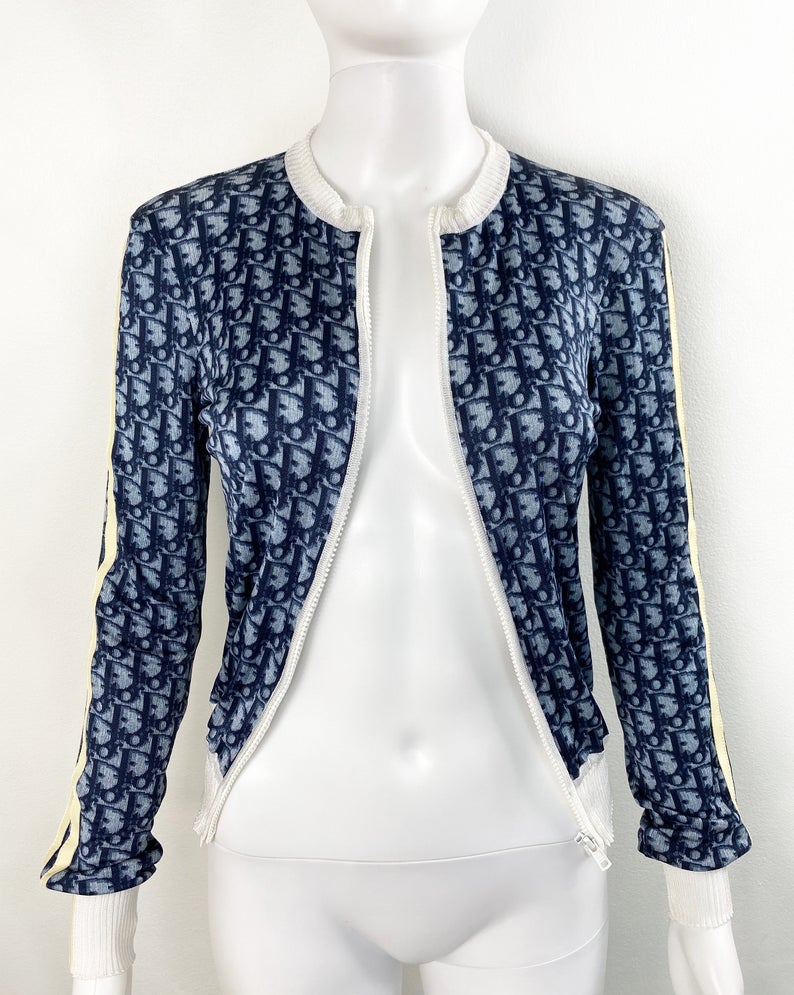 Fruit Vintage Christian Dior oblique logo zipper knit is about as iconic as it gets. Inspired by the original Dior trotter monogram canvas luggage and accessories, and re-released under the creative direction of John Galliano.