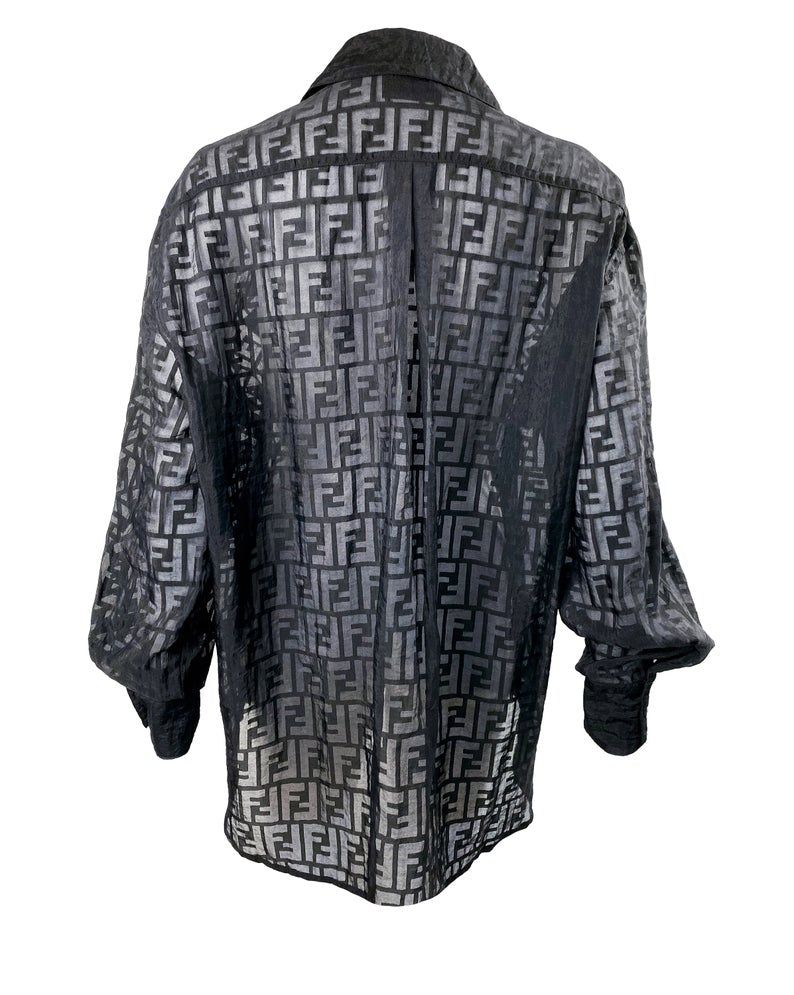 FRUIT vintage Fendi Zucca print button up shirt dating to the early 90s. This cute sheer variation of the classic Fendi Zucca print features a classic button up cut, and Fendi logo button closure.