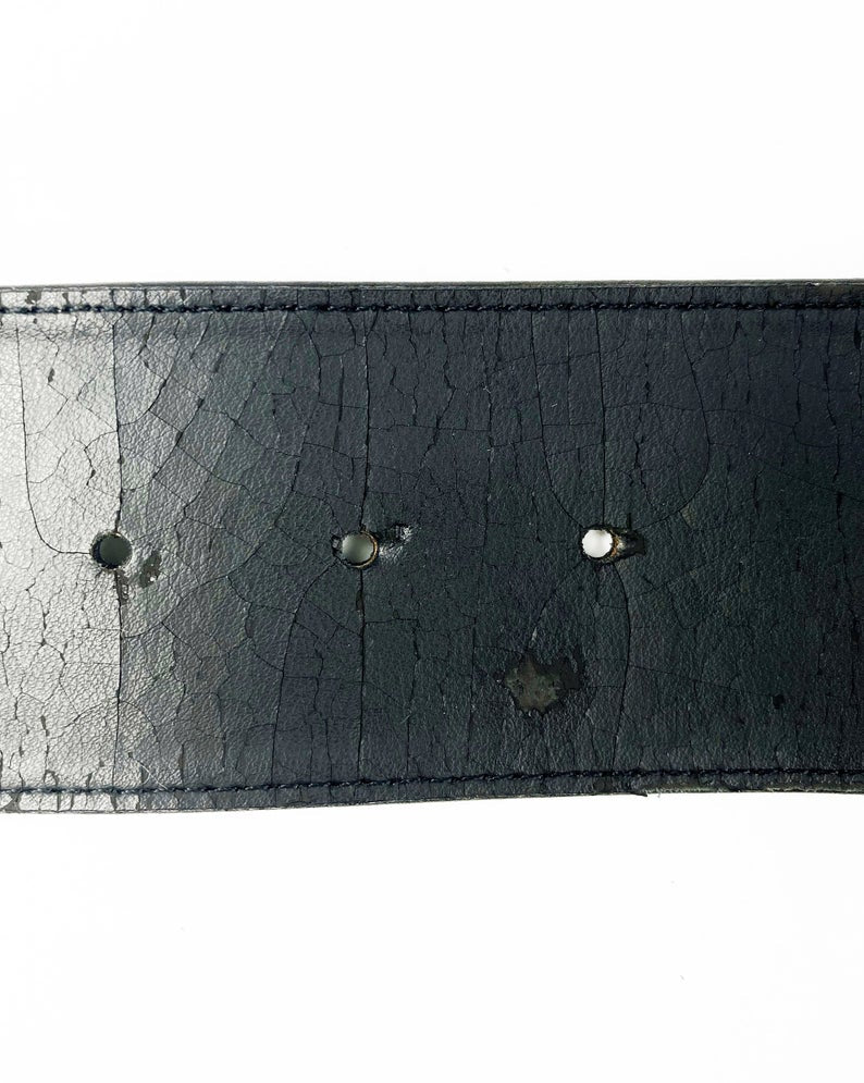 Fruit Vintage Chanel Logo Waist Belt dating to 1997. It features a very large gold bar with CHANEL logo at the front, internal logo foil stamp and date, and gold buckle at rear.