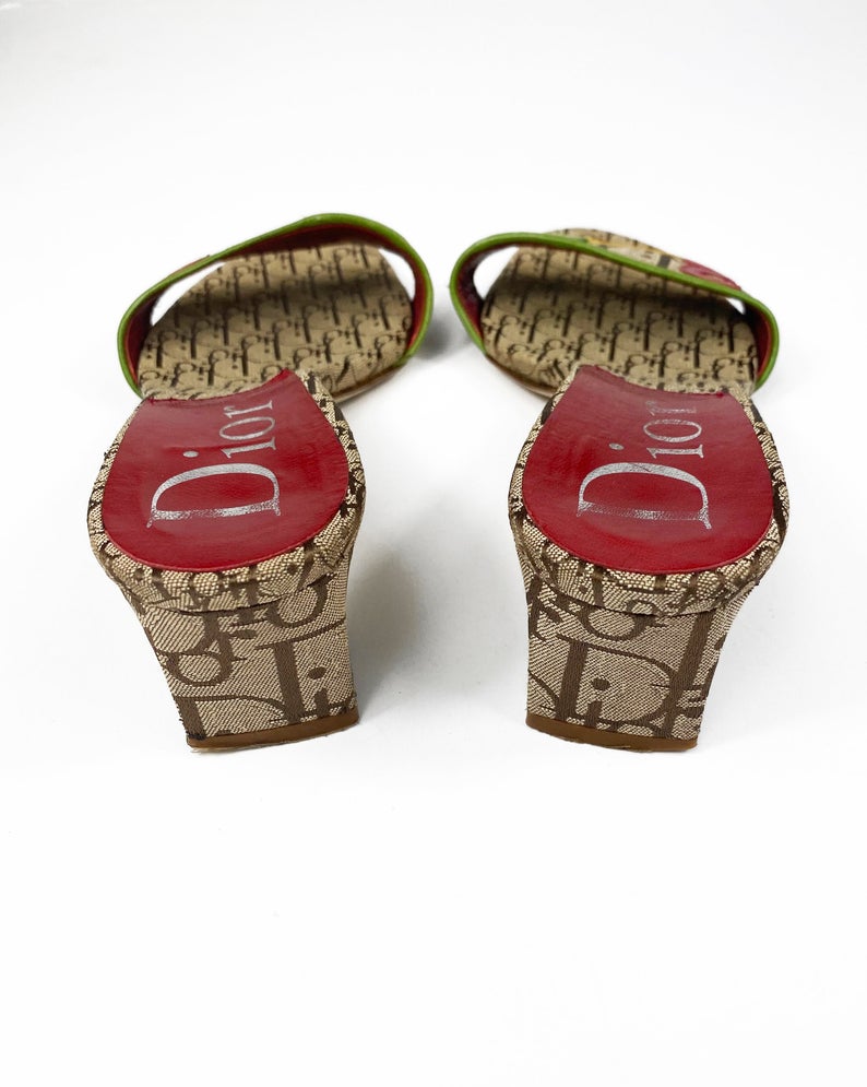 Fruit Vintage Christian Dior rasta logo kitten heel mules in monogram canvas. They feature the iconic Dior number in leather appliqué and racing stripes in cotton twill.