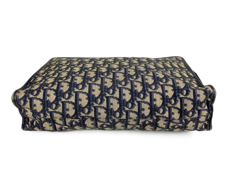 FRUIT Vintage Christian Dior 1980s navy trotter oblique monogram clutch bag. Features a classic pochette style shape with top zipper, internal pockets and vinyl lining.