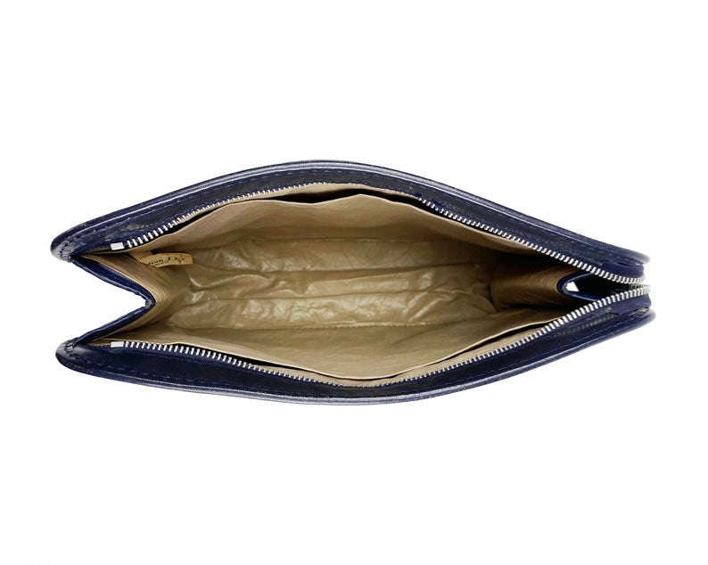FRUIT Vintage Christian Dior 1980s navy trotter oblique monogram clutch bag. Features a classic pochette style shape with top zipper, internal pockets and vinyl lining.