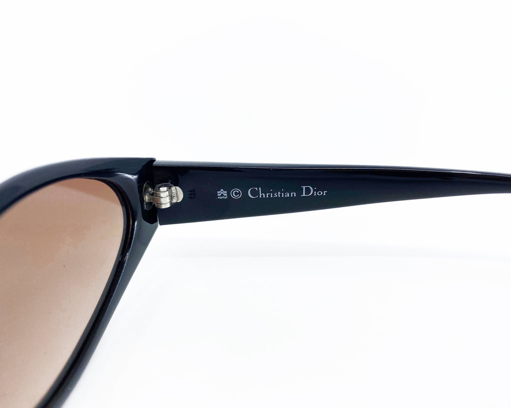 Fruit Vintage Christian Dior sunglasses dating to 1990. These small oval frames feature a gold trim over the nose and CD logo to each arm.