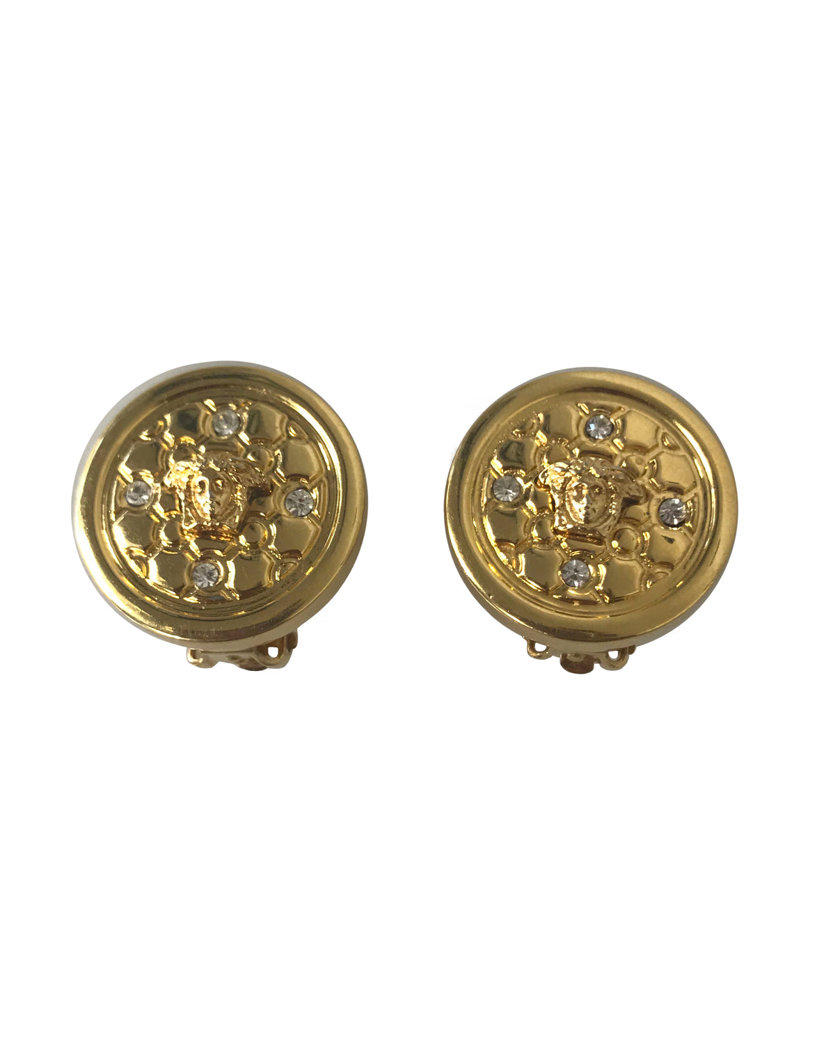 Fruit Vintage Gianni Versace 1980s clip-on coin shaped earrings with small Medusa heads, surrounded by rhinestones.