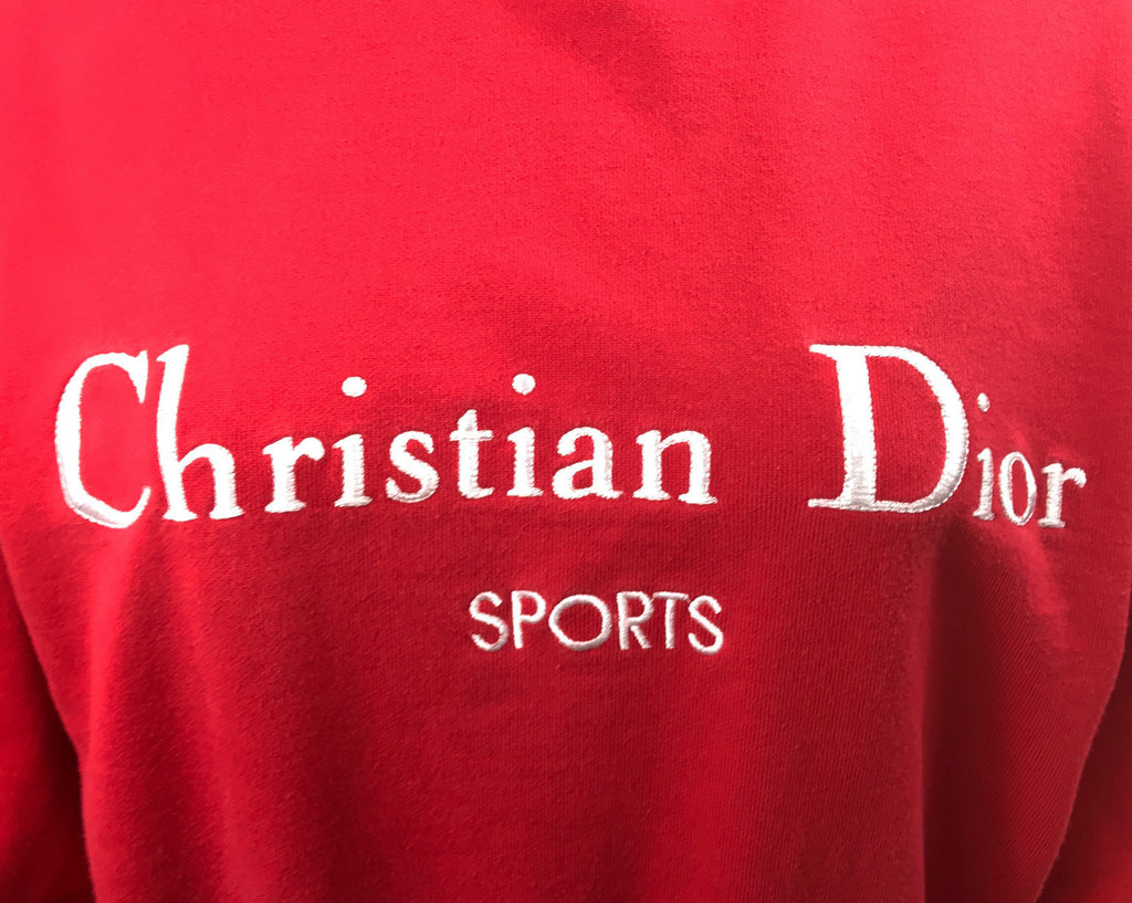 Fruit Vintage 1980s Christian Dior Sport Red Logo sweat shirt. It features a large embroidered logo design at front and classic sweat shirt cut.