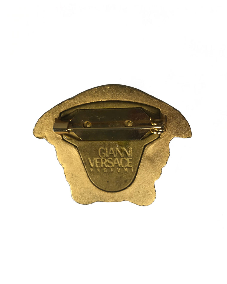 Fruit Vintage rare Gianni Versace 1980s Medusa head brooch. Marked 'Gianni Versace Profumi' it dates back to the early 80's.