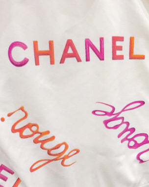 FRUIT Vintage rare Chanel Rouge 1996 Logo text off white one piece swimsuit bodysuit by Karl Lagerfeld. Features a large pink text print and a classic flattering cut with low back.