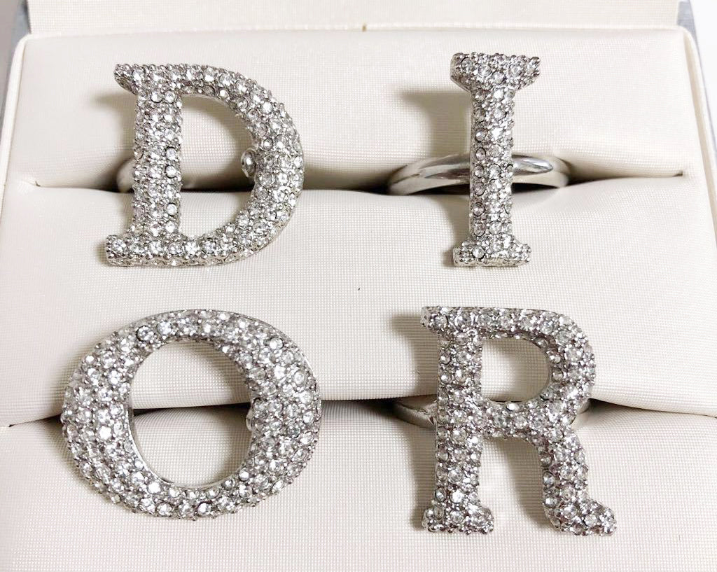 Fruit Vintage large Christian Dior diamonte crystal silver logo ring set as worn by Carrie Bradshaw on Sex and The City and Lady Gaga. Each letter is designed to be worn on a separate finger in the style of knuckle dusters.